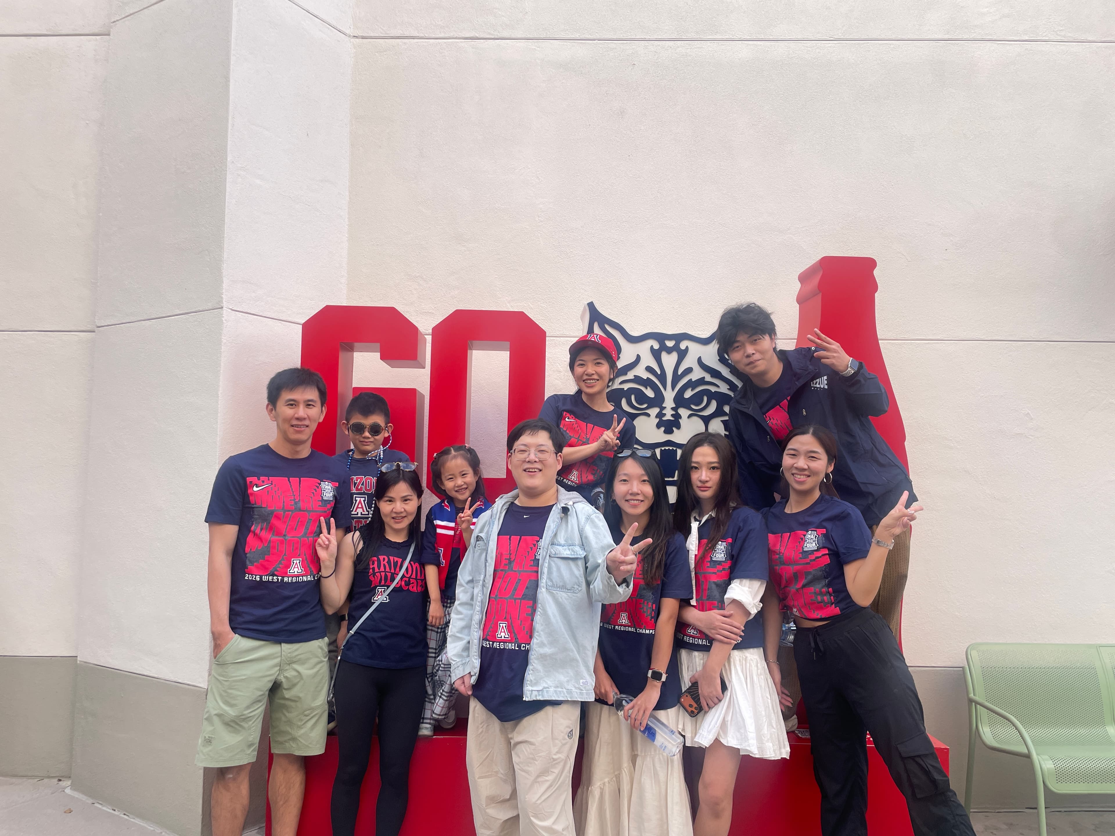 Yuxin Lin with her Ph.D. student family at a University of Arizona Final Four gathering.