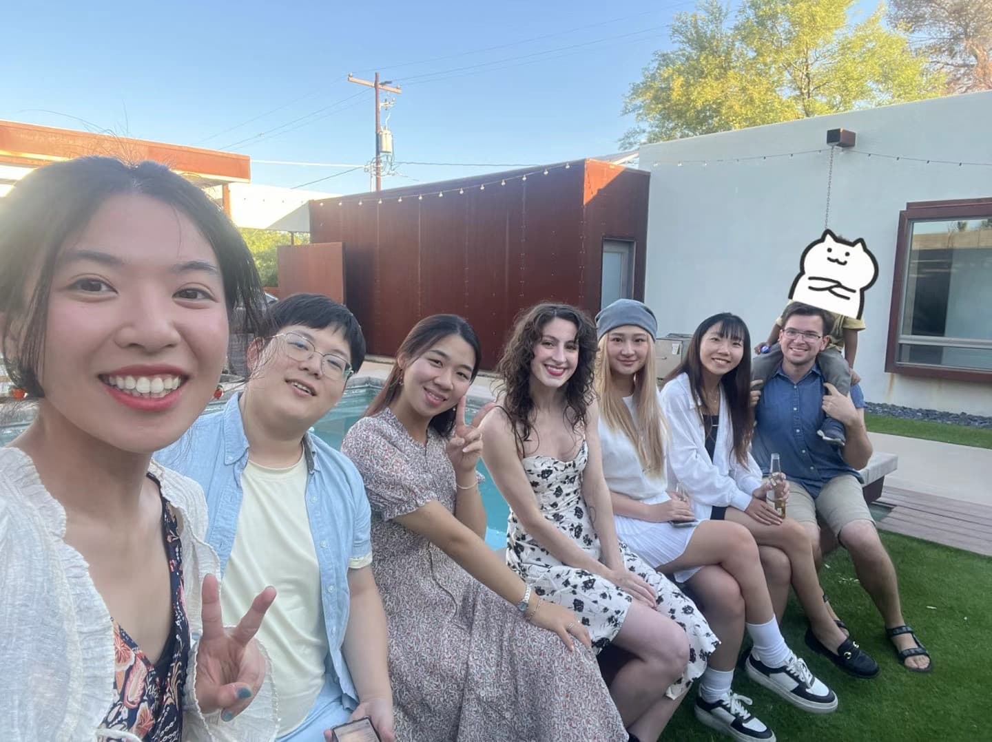 Yuxin Lin with friends from her Ph.D. community at an outdoor gathering.