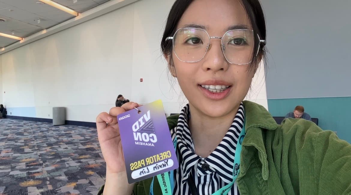 Yuxin Lin holding a VidCon creator pass during fieldwork.